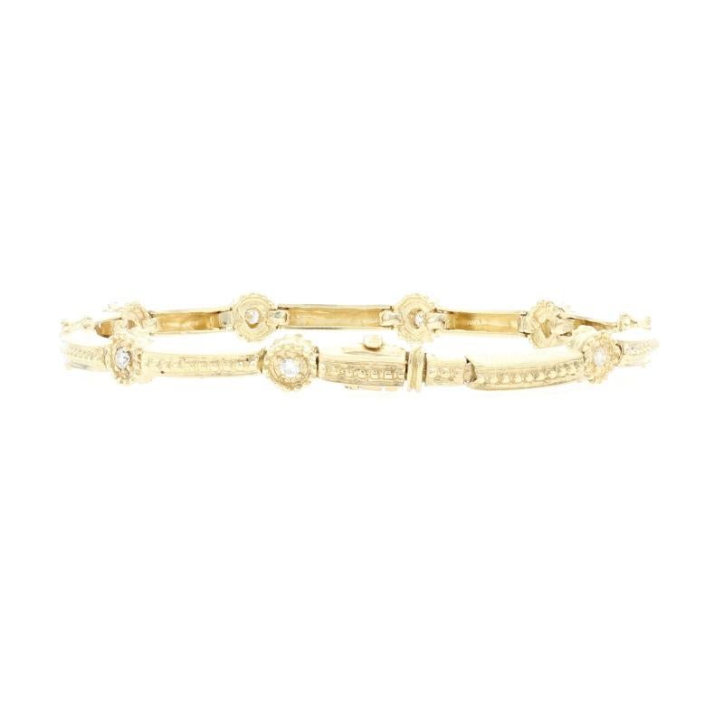 Metal Content: 14k Yellow Gold 

Stone Information: 
Natural Diamonds
Total Carats: .45ctw
Cut: Round Brilliant 
Color: F - G   
Clarity: SI2 - I1 

Bracelet Style: Link 
Closure Type: Tab Box Clasp with Fold-Under Safety Clasp
Features: Matte