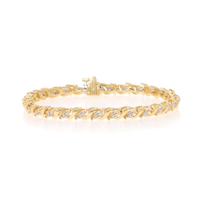 Metal Content: 14k Yellow Gold & 14k White Gold

Stone Information

Natural Diamonds
Carat(s): .66ctw
Cut: Single
Color: G - H
Clarity: SI1 - SI2

Total Carats: .66ctw

Style: Link
Fastening Type: Tongue Box Clasp with Fold-Under Safety Clasp
Theme: