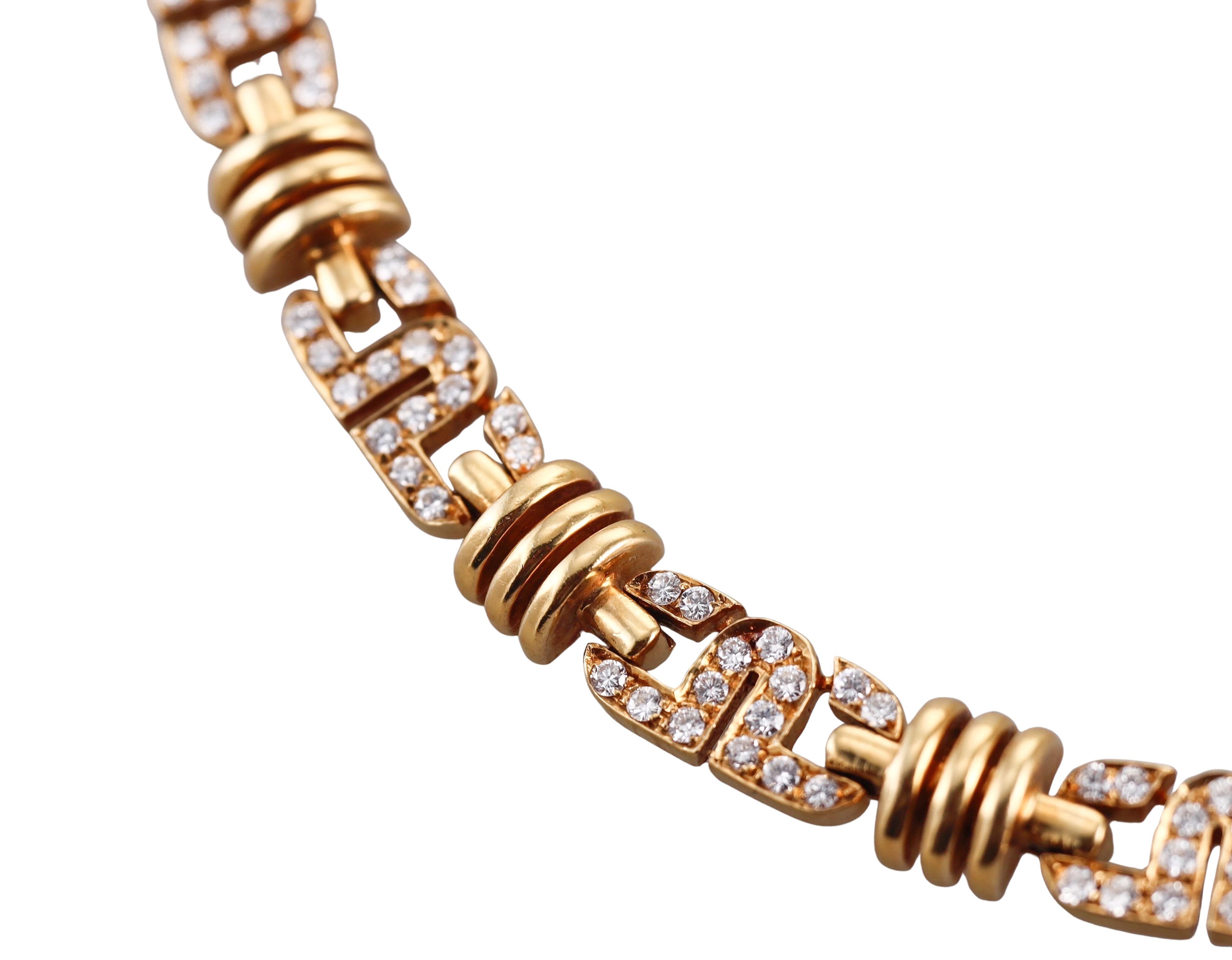 18k yellow gold link necklace, set with a total of approx. 1.65ctw H/VS diamonds.
Necklace is 16.5