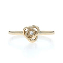 Anello solitario con nodo d'amore in oro giallo - Trio di cerchi a taglio singolo da 10k