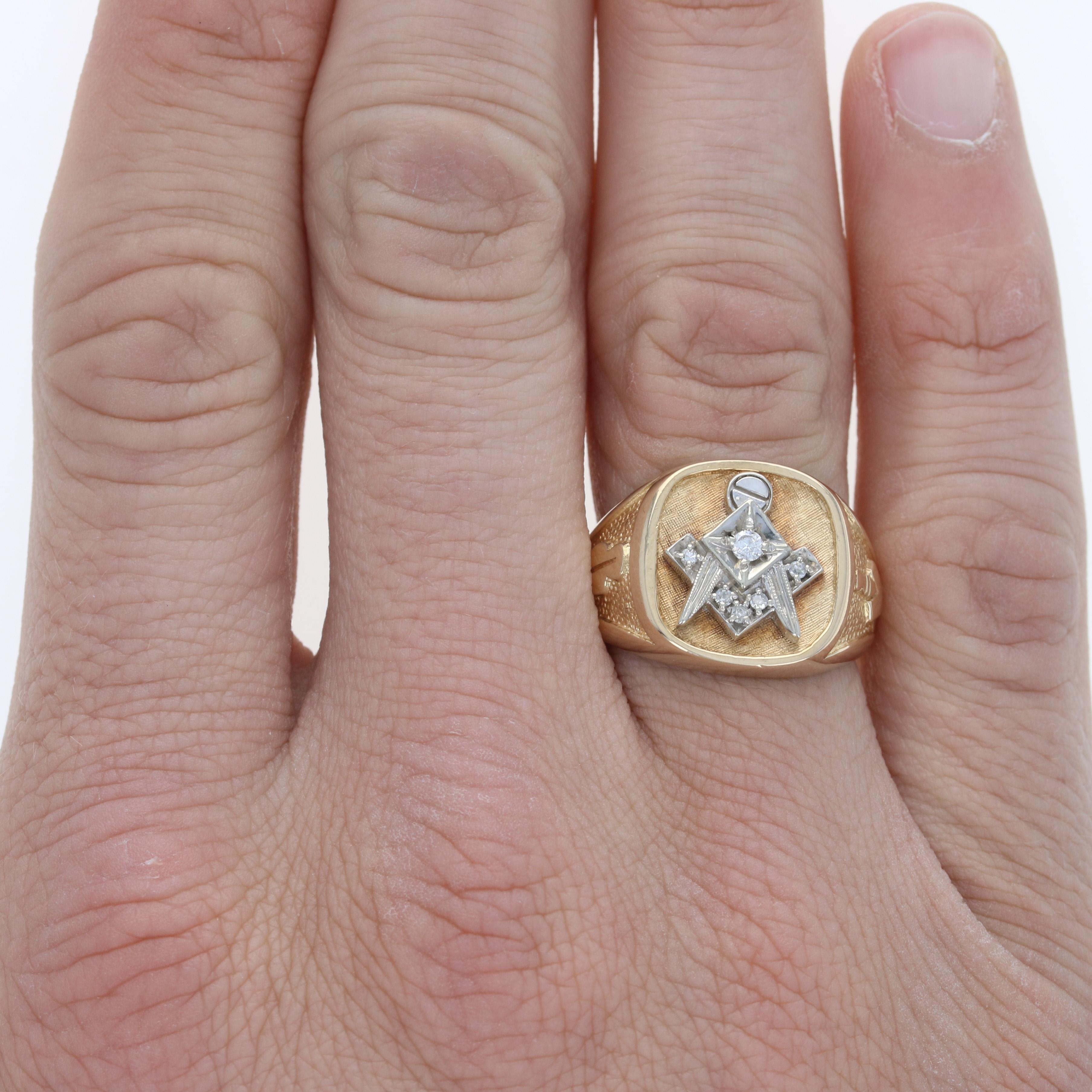 Size: 10 1/4
 Sizing Fee: Up 2 sizes for $50 or Down 2 sizes for $40
 
 Men's Masonic Organization: Blue Lodge
 
 Metal Content: 10k Yellow Gold & 10k White Gold
 
 Stone Information: 
 Natural Diamonds
 Total Carats: .10ctw
 Cuts: Mine (largest) &