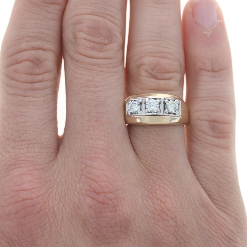 Size: 9 1/2
Sizing Fee: Up 2 sizes for $70 or Down 2 sizes for $50

Metal Content: 14k Yellow Gold & 14k White Gold

Stone Information

Natural Diamond
Carat(s): .35ct
Cut: Round Brilliant
Color: K
Clarity: SI2
Stone Note: (center)

Natural