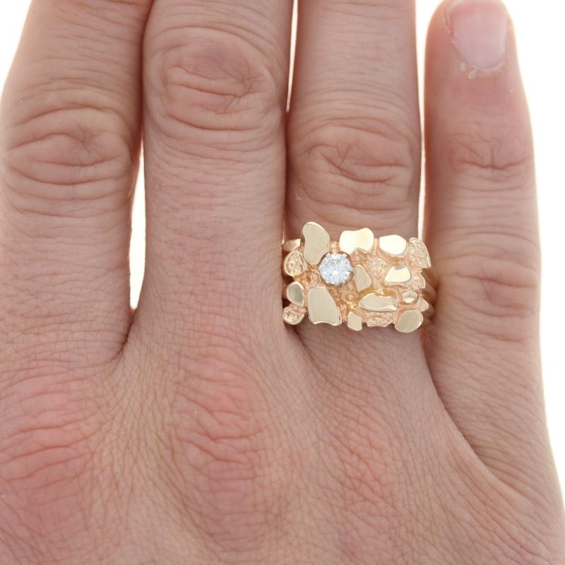 Size: 11 1/4
Sizing Fee: Down 3 sizes for $50 or up 2 sizes for $60

Metal Content: 14k Yellow Gold & 14k White Gold

Stone Information
Natural Diamond
Carat: .33ct
Cut: Round Brilliant
Color: G
Clarity: VS2
Diameter: 4.4mm

Style: