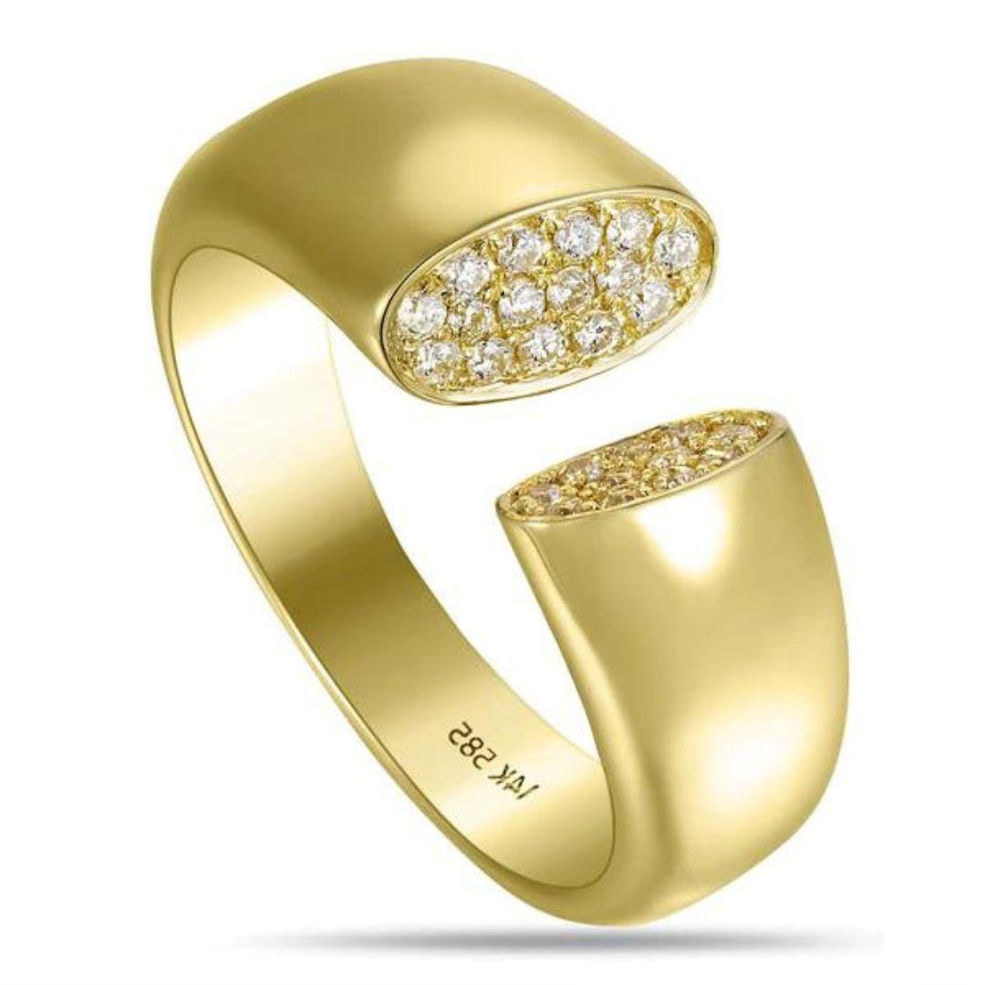 
Elegant and contemporary yellow gold band with open space and intricate pave diamond elements. Great gift for an anniversary, birthday or any special occasion (cocktail party, anyone?) Band contains twenty six round white diamonds, H-I color, SI