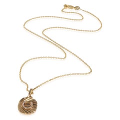 Pendentif en or jaune avec disque ovale en diamant et fer à cheval
