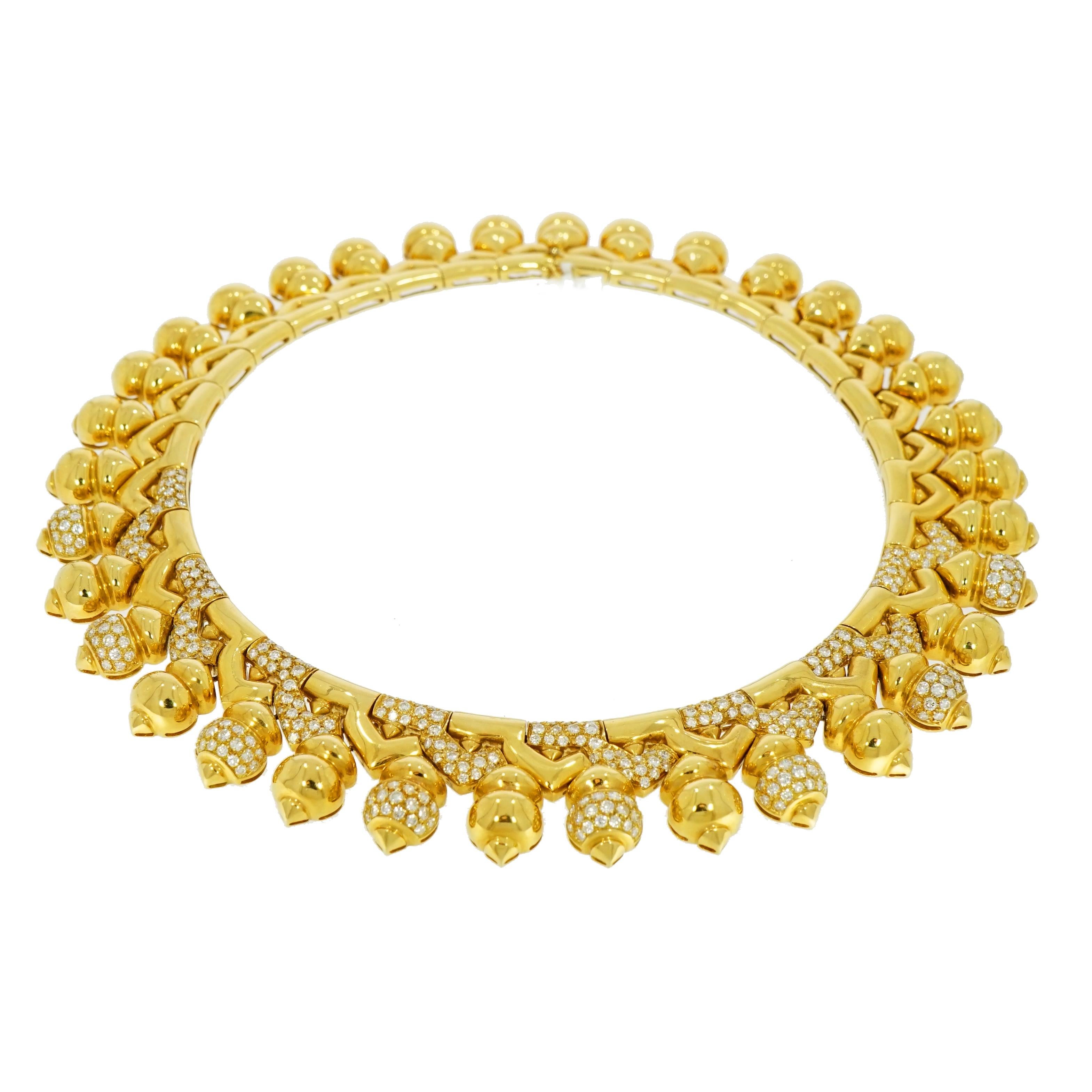 Classic and sophisticated, this vintage style necklace is one of a kind! 
The design is elegant and richly adorned with diamonds making it look gorgeous. 
Crafted in 18k yellow gold and near colorless round diamonds.
It has a beautiful and eye