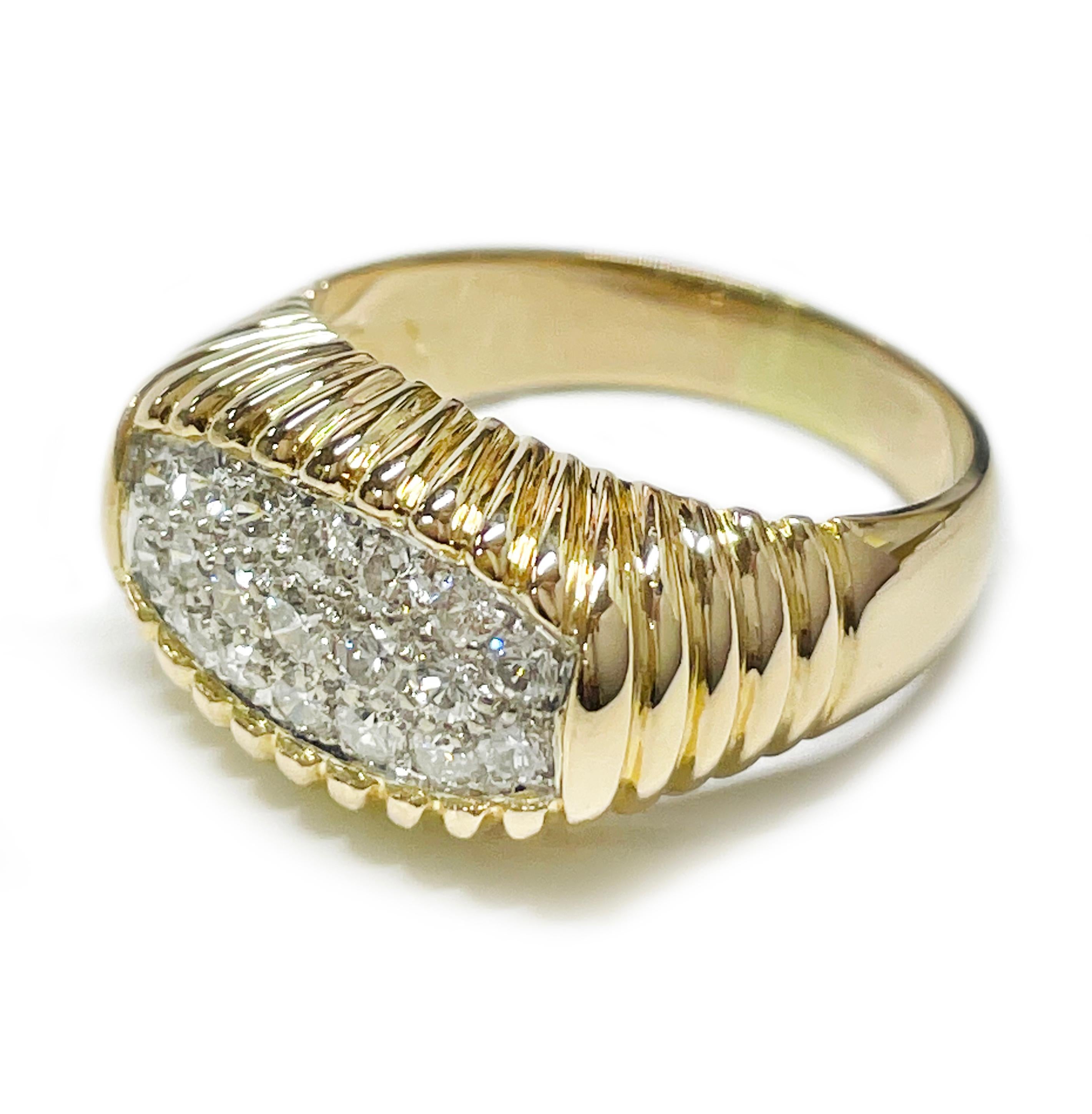 18 Karat Two-Tone White and Yellow Gold Diamond Pavé Ring. The ring features nineteen round pave brilliant-cut diamonds set in white gold. There are seventeen 2.0mm diamonds with a carat weight 0.51ctw, and two 2.5mm diamonds with a carat weight of