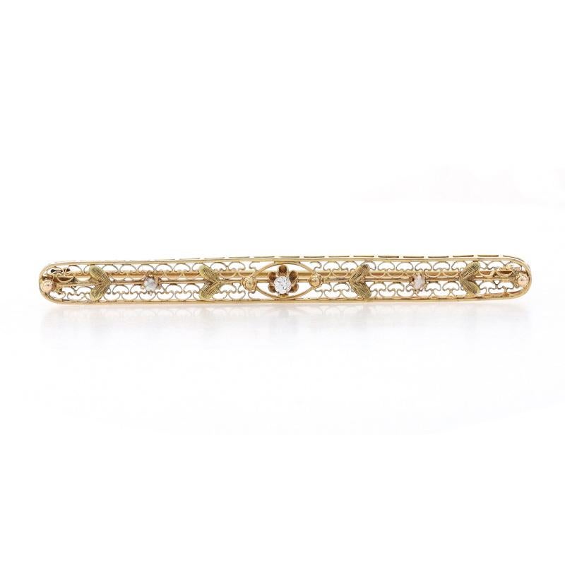 Era: Art Deco
Date: 1920s - 1930s

Metal Content: 14k Yellow Gold

Stone Information
Natural Diamond
Carat(s): .05ct
Cut: Mine
Color: G
Clarity: SI1

Natural Seed Pearls

Style: Bar Brooch
Fastening Type: Hinged Pin and Locking C-Clasp
Features: