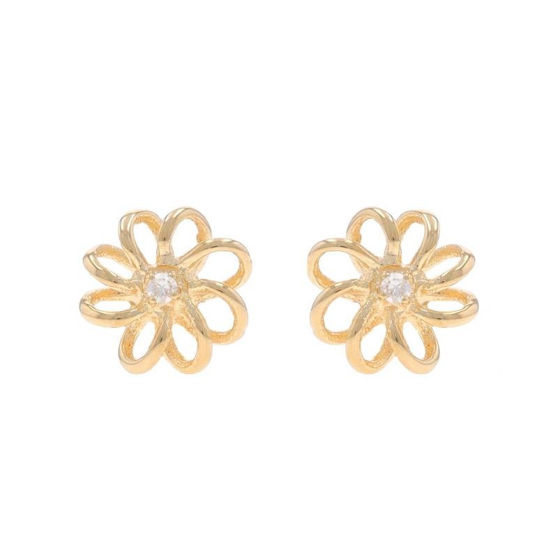 Metal Content: 14k Yellow Gold

Stone Information

Natural Diamonds
Carat(s): .02ctw
Cut: Single
Color: G - H
Clarity: VS1 - VS2

Style: Stud
Fastening Type: Butterfly Closures
Theme: Pinwheel Flower

Measurements

Tall: 5/16