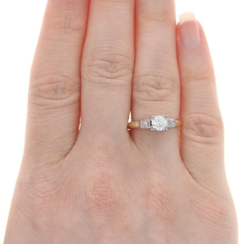 Size: 6 3/4
Sizing Fee: Down 2 for $30 or up 2 for $35

Era: Retro
Date: 1940s

Metal Content: 14k Yellow Gold & 14k White Gold

Stone Information

Natural Diamond Solitaire
Carat: .53ct
Cut: Transitional 
Color: J 
Clarity: SI2

Natural Diamond