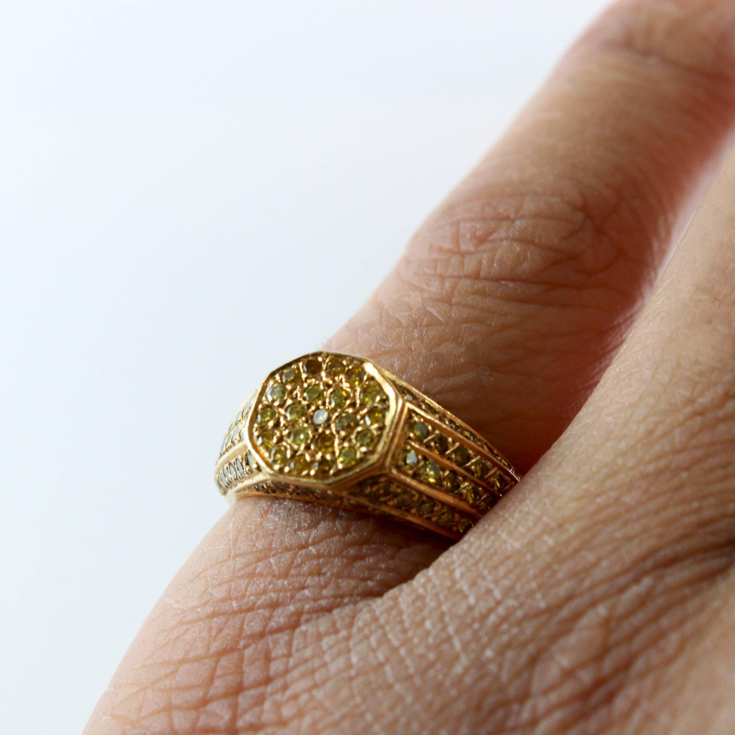 A yellow diamond pave set ring in yellow gold. The approximate diamond weight is 1.3 carats.