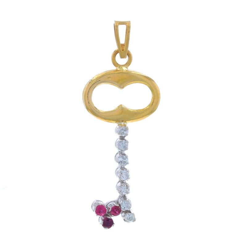 Metal Content: 18k Yellow Gold & 18k White Gold

Stone Information

Natural Diamonds
Carat(s): .07ctw
Cut: Round Brilliant
Color: F - G
Clarity: SI2 - I1

Natural Rubies
Treatment: Heating
Carat(s): .06ctw

Total Carats: .13ctw

Theme: Skeleton