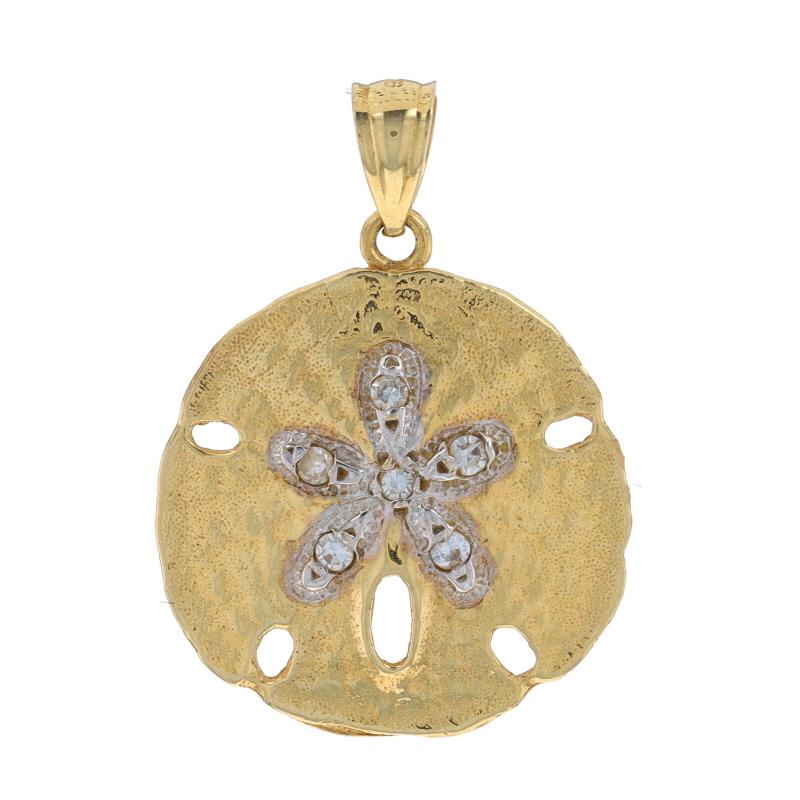 Metal Content: 14k Yellow Gold & 14k White Gold

Stone Information
Natural Diamonds
Carat(s): .12ctw
Cut: Single
Color: H - I
Clarity: VS2 - SI1

Total Carats: .12ctw

Theme: Sand Dollar, Ocean Life
Features: Smooth & Textured Finishes with Milgrain