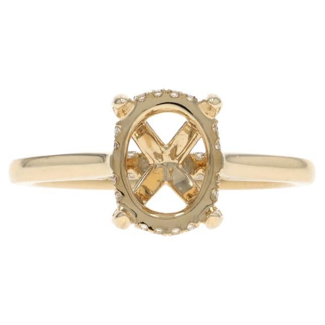 Anillo de compromiso de oro amarillo con semimontura de diamantes y halo oculto - 14k redondo .12ctw