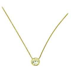 Collier pendentif solitaire à lunette en or jaune et diamants
