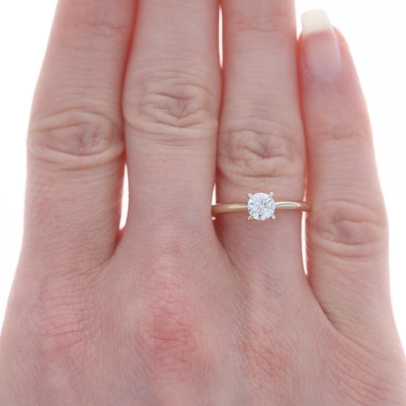 Yellow Gold Diamond Solitaire Engagement Ring 10k Round Brilliant .50ct

Stone Information:
Natural Diamond
Carat(s): .50ctw
Cut: Round Brilliant
Color: J
Clarity: I1

Total Carats: .50ct

Additional information:
Material: Metal 10k Yellow