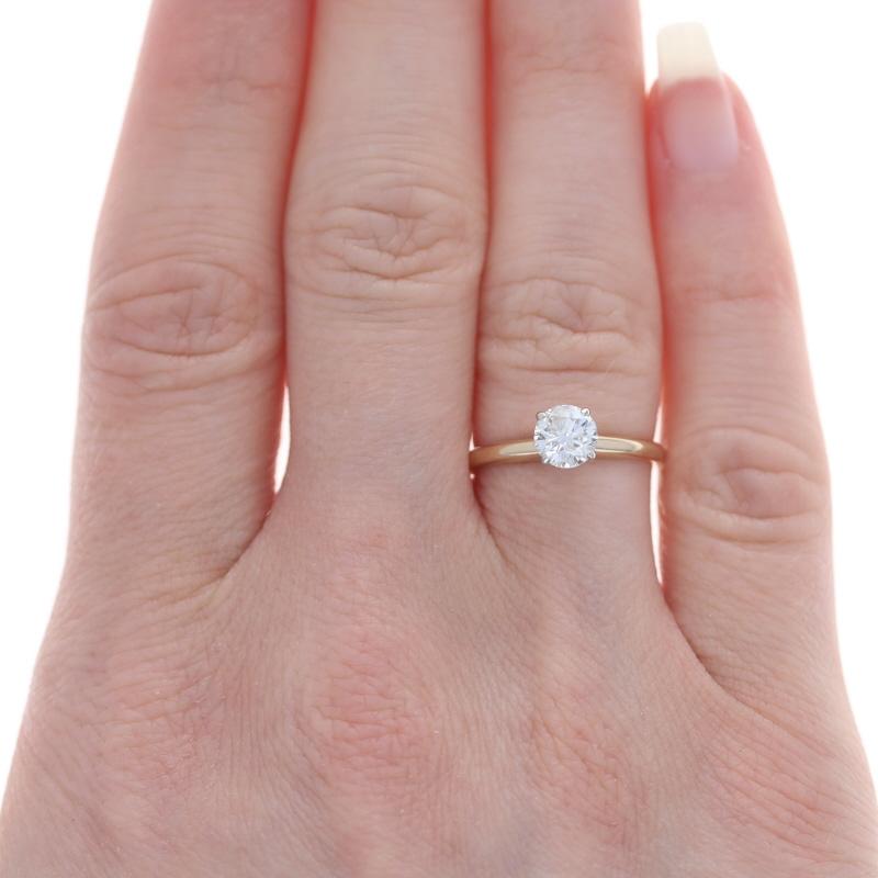 Size: 5 1/2
Sizing Fee: Up 2 sizes for $35 or Down 2 sizes for $30

Brand: Leo Schachter

Metal Content: 14k Yellow Gold & 14k White Gold

Stone Information

Natural Diamond
Carat(s): .72ct
Cut: Round Brilliant
Color: H
Clarity: I1

Total Carats: