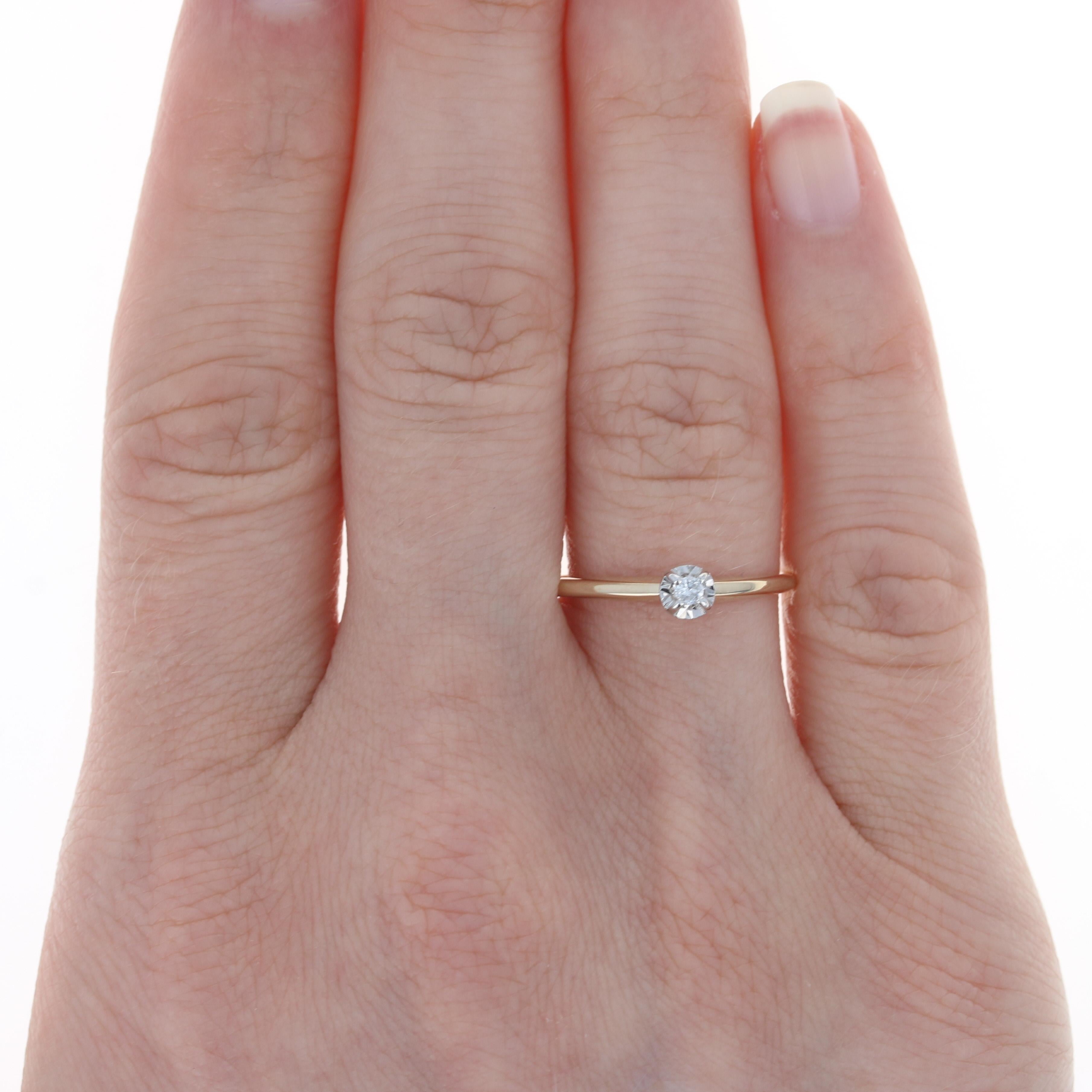 Size: 7 1/4
Sizing Fee: Down 4 sizes for $30 or up 2 sizes for $35

Metal Content: 14k Yellow Gold & 14k White Gold

Stone Information
Natural  Diamond
Carat: .05ct
Cut: Round Brilliant
Color: G
Clarity: I1

Style: Solitaire

Measurements
Face