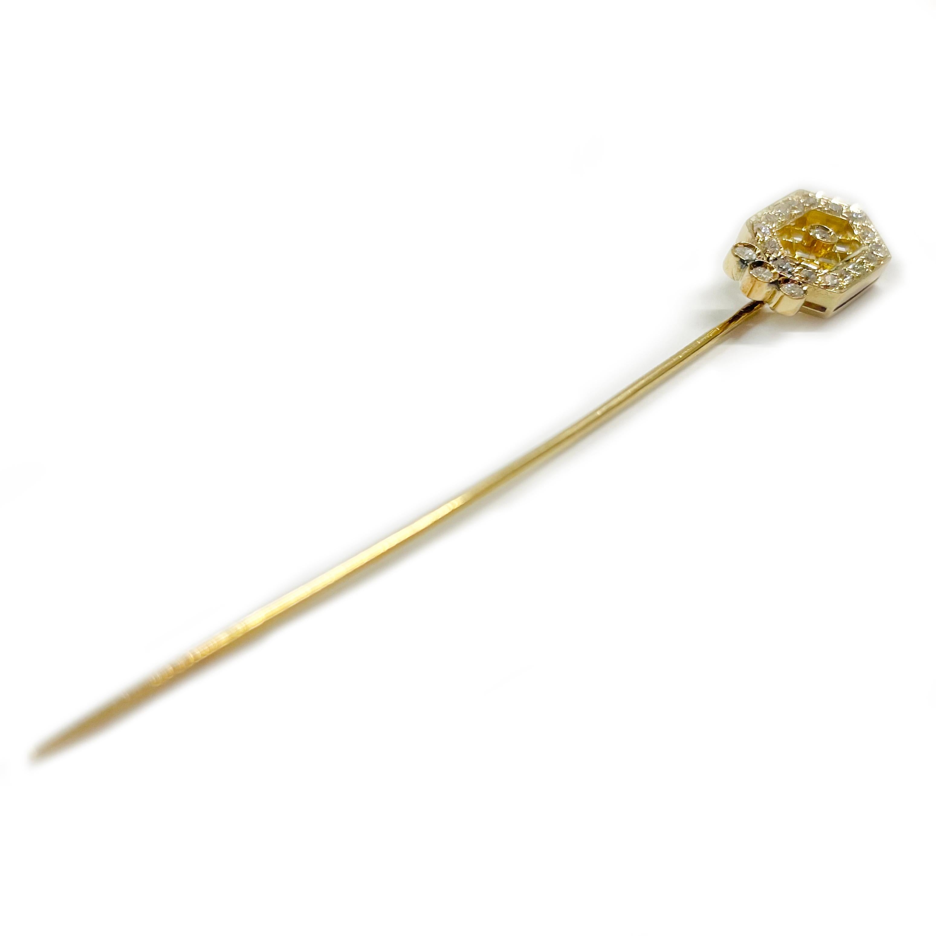 18 Karat Yellow Gold Diamond Stick Pin. This lovely pin features twenty round bead and bezel-set diamonds. There are sixteen 1.56mm diamonds and four 1.8mm diamonds for a total carat weight of 0.34ctw. The diamonds are set on an elongated hexagon