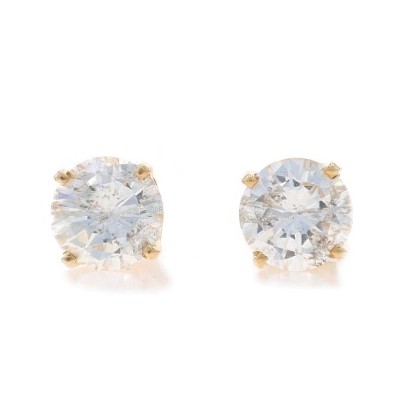Metal Content: 14k Yellow Gold

Stone Information

Natural Diamonds
Carat(s): 1.70ctw
Cut: Round Brilliant
Color: G - H
Clarity: I1

Total Carats: 1.70ctw

Style: Stud
Fastening Type: Screw-On Butterfly Closures

Measurements

Tall: 1/4