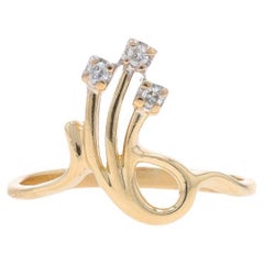 Yellow Gold Diamond Three-Stone Ring - 14k Round Brilliant Ribbon Loop