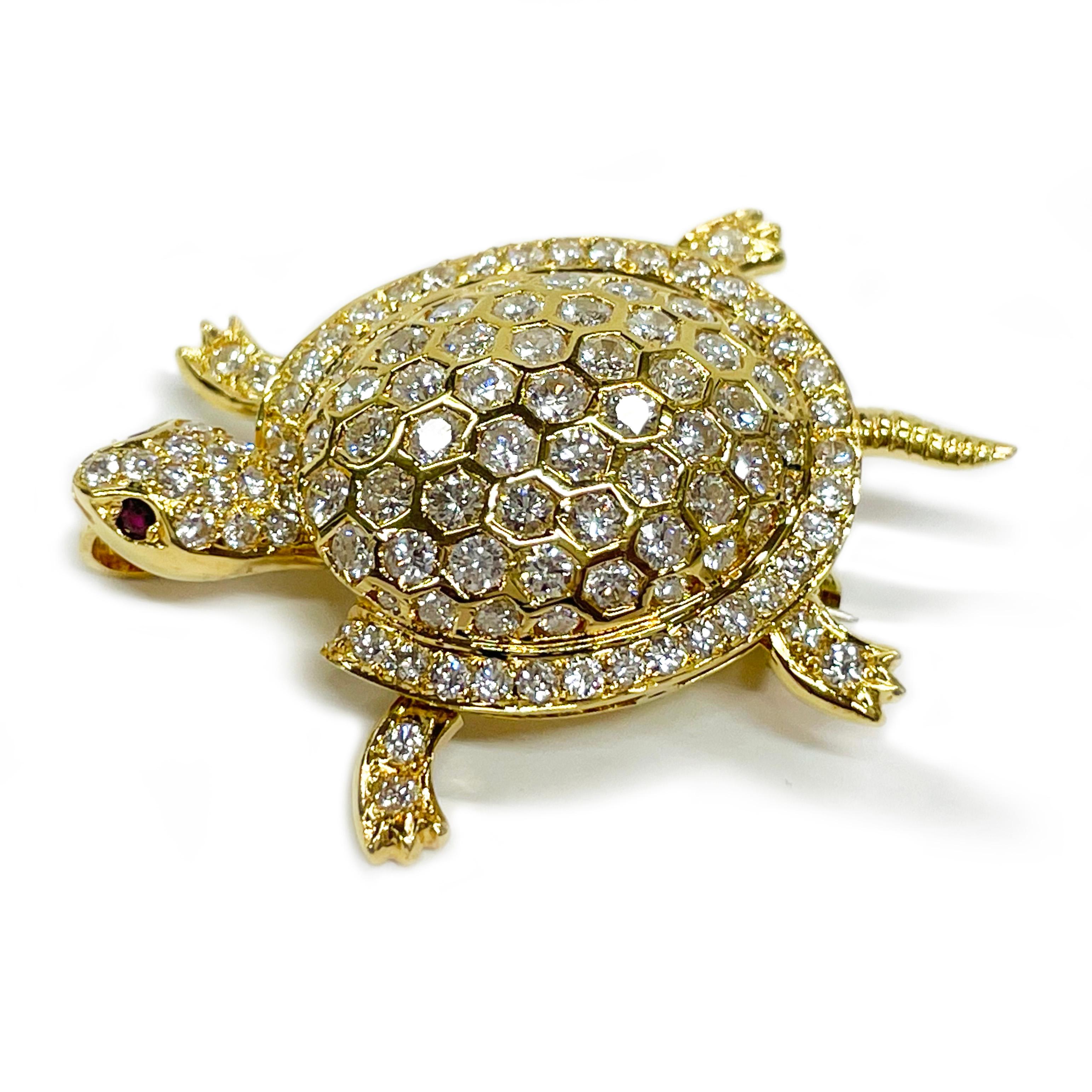 18 Karat Yellow Gold Diamond Turtle Pendant/Brooch. This adorable little fellow has a moveable head, tail, and legs. Brilliant-cut diamonds adorn the shell, legs, and head of the turtle with rubies set in the eyes. There are thirty-four 2.0mm