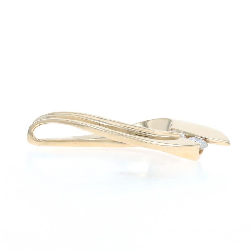 Metal Content: 14k Yellow Gold

Stone Information

Natural Diamonds
Carat(s): .30ctw
Cut: Round Brilliant
Color: G - H
Clarity: SI2 - I1

Total Carats: .30ctw

Style: Two-Stone Slide
Theme: Teardrop Ribbon

Measurements

Tall (from stationary