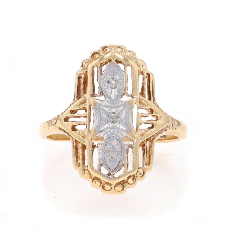 Size: 3
Sizing Fee: Up 2 sizes for $30 or Down 1 size for $30

Era: Vintage

Metal Content: 10k Yellow Gold & 10k White Gold

Stone Information

Natural Diamonds
Cut: Single
Stone Note: (Three small accents)

Style: Three-Stone
Features: Filigree &