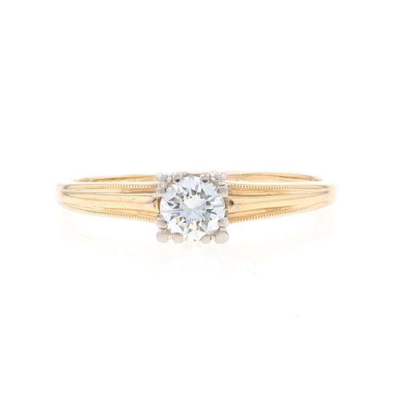 Size: 7
Sizing Fee: Up 3 sizes for $35 or Down 3 sizes for $35  

Era: Vintage

Metal Content: 14k Yellow Gold & 14k White Gold

Stone Information
Natural Diamond
Carat(s): .34ct
Cut: Round Brilliant
Color: K
Clarity: SI1

Total Carats: