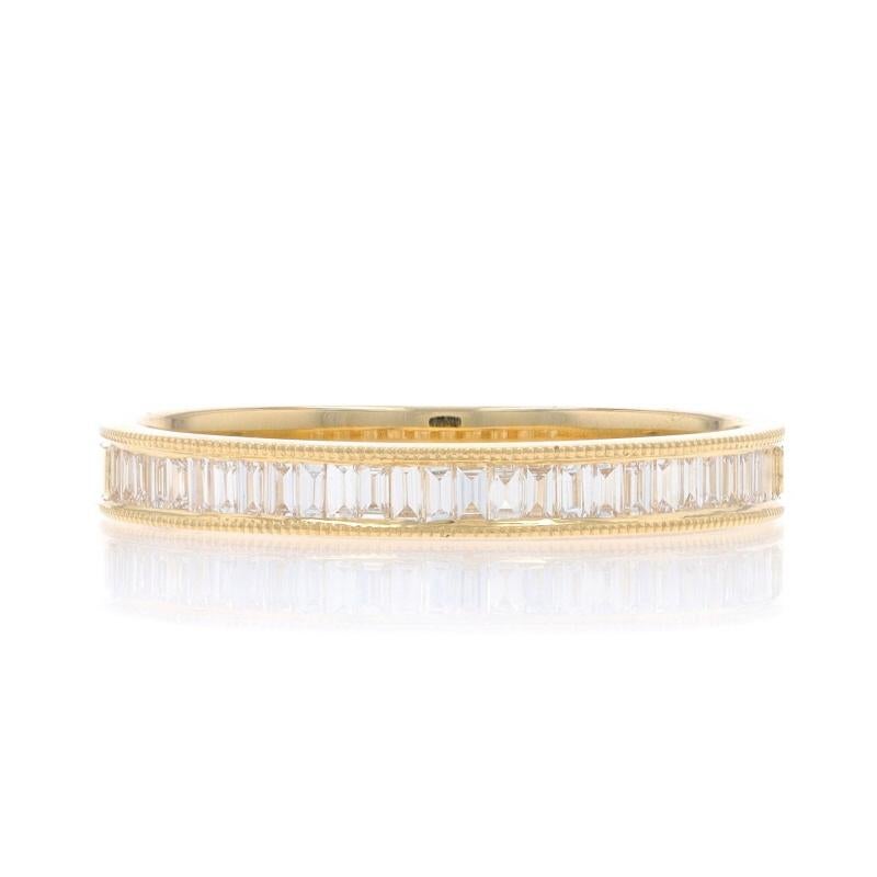 Size: 6 1/2

Metal Content: 14k Yellow Gold

Stone Information

Natural Diamonds
Carat(s): .24ctw
Cut: Baguette
Color: F - G
Clarity: VS2 - SI1

Total Carats: .24ctw

Style: Wedding Band with Diamonds
Features: Milgrain Detailing

Measurements

Face