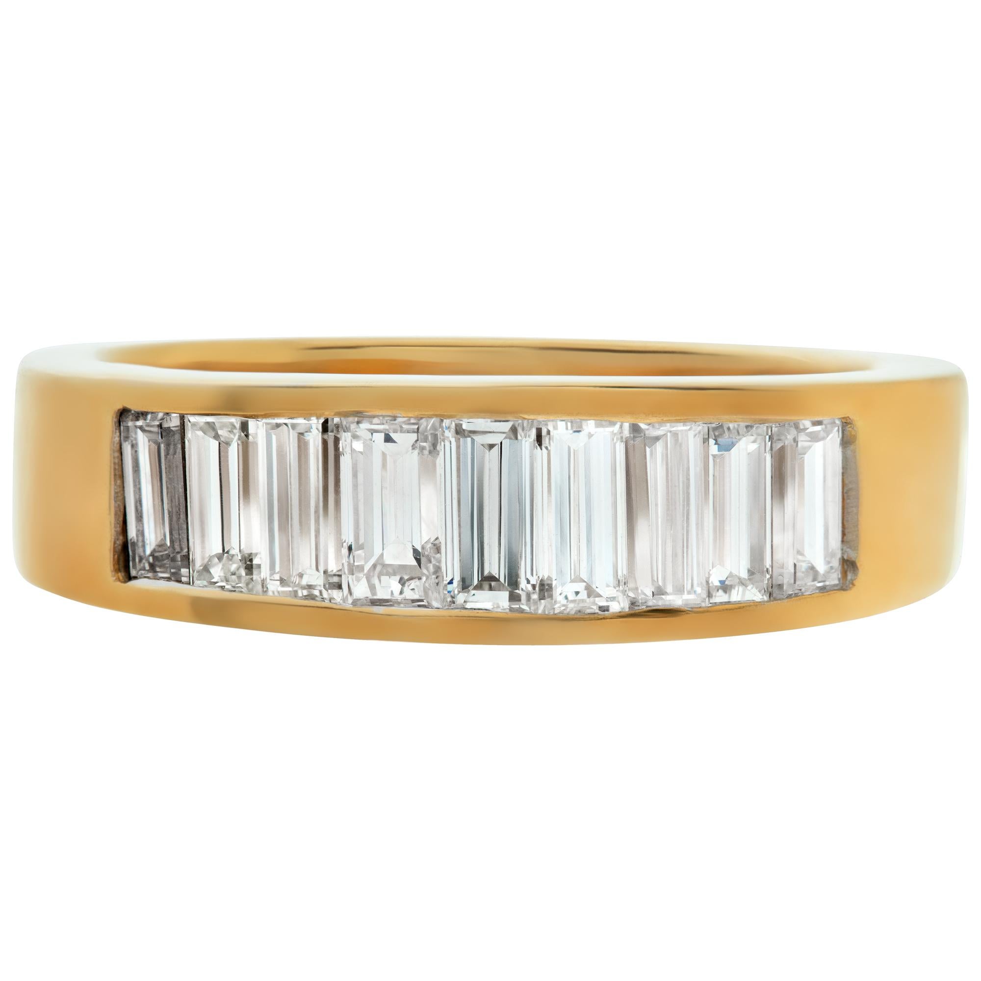 Baguette diamond wedding band in 18k yellow gold with approximately 1.4 carats in baguette cut diamonds (G-H Color, VS Clarity). Size 6.75This Diamond ring is currently size 6.75 and some items can be sized up or down, please ask! It weighs 4.4