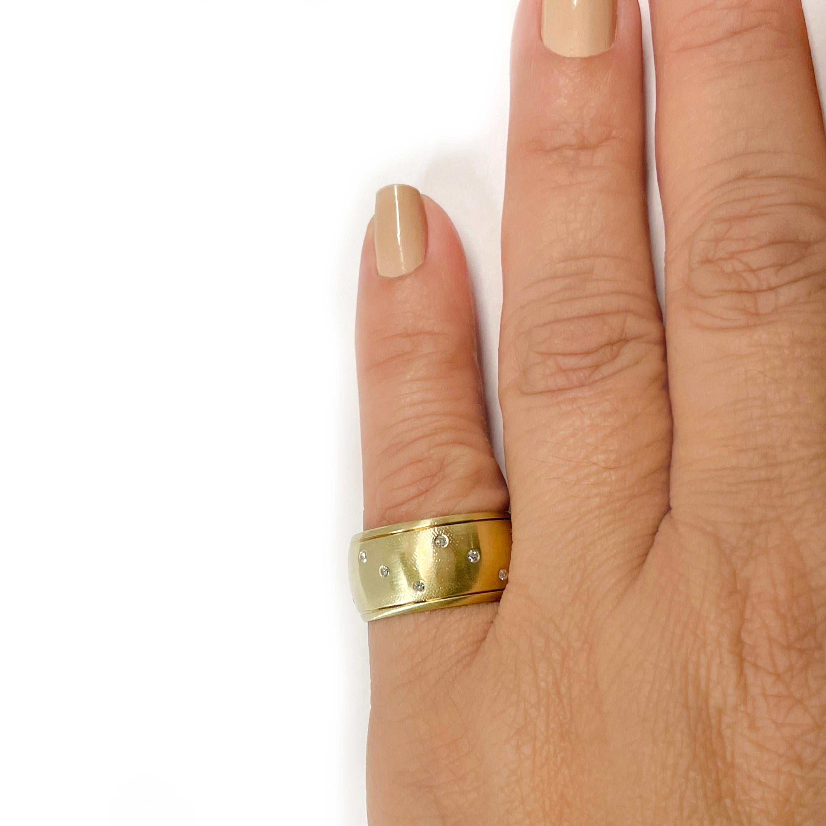 wide gold band with diamonds inset