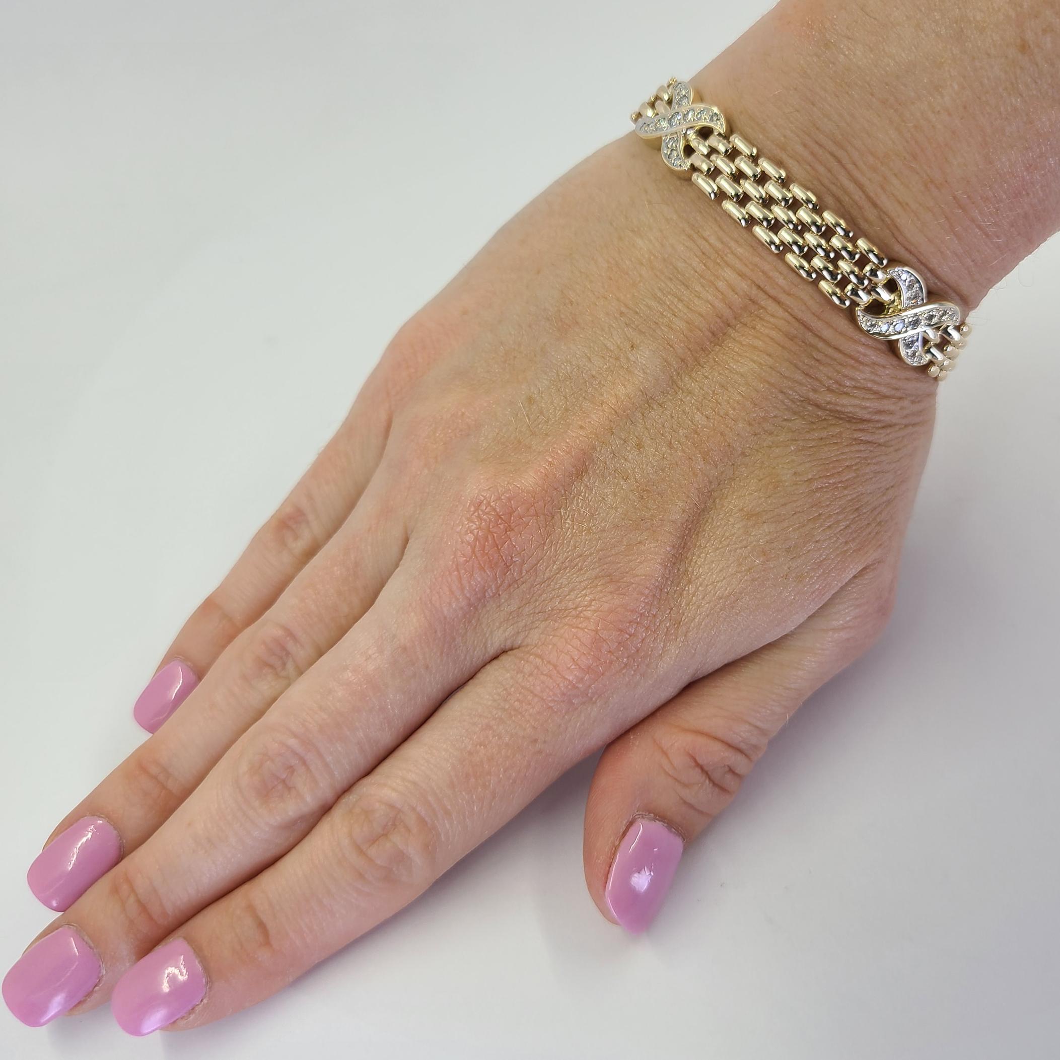 14 Karat Gelbgold 10mm breites Armband mit 4 X-Stationen mit 39 runden Diamanten im Brillantschliff von VS Reinheit & G Farbe von insgesamt 1,00 Karat. 7 Zoll lang mit Box Clasp & Abbildung 8 Sicherheit. Das fertige Gewicht beträgt 24 Gramm.