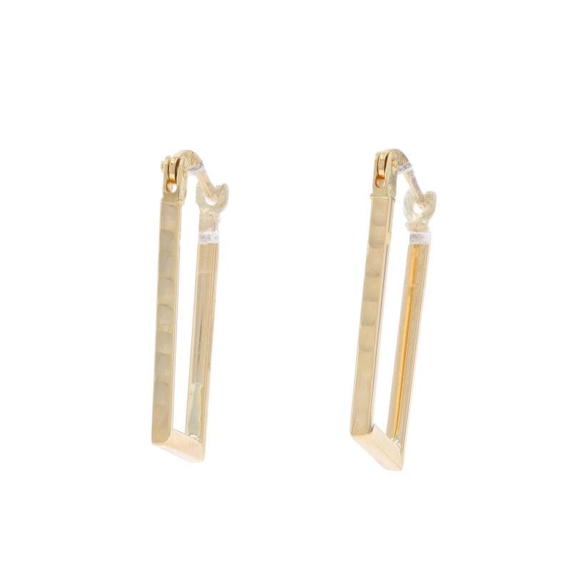 Metal Content: 14k Yellow Gold

Style: Hoop
Fastening Type: Snap Closures
Theme: Geometric
Features: Rectangular Silhouette with Dimpled Exterior Detailing

Measurements

Tall: 23/32