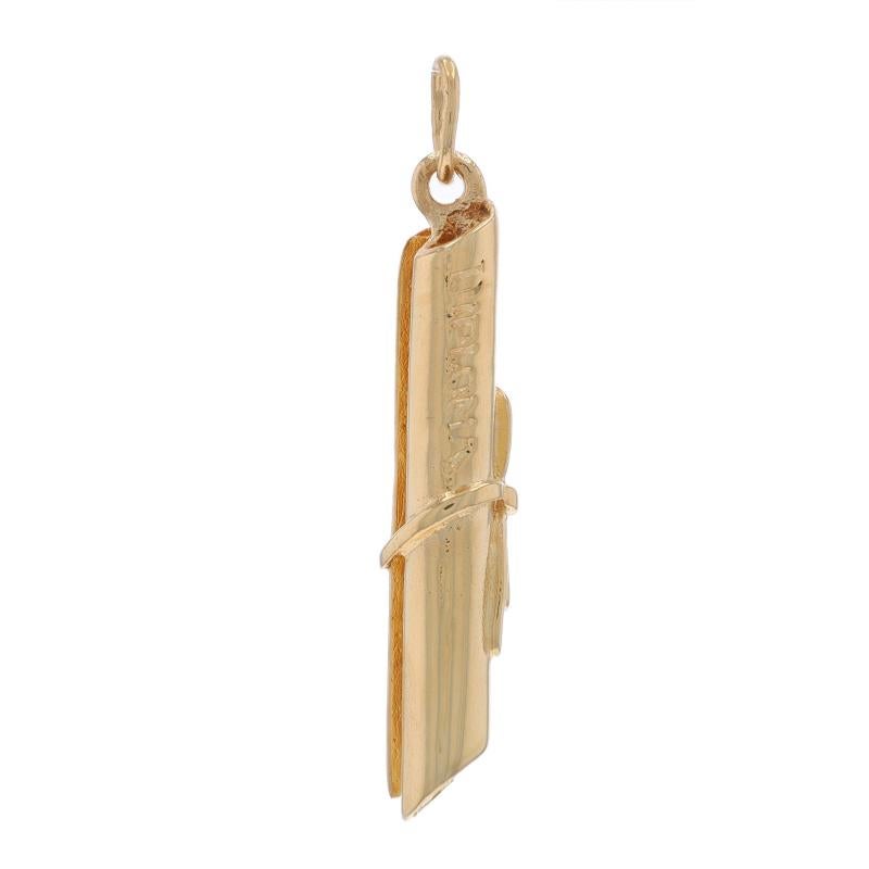 Metal Content: 14k Yellow Gold

Theme: Diploma, Graduate Gift, Academic

Measurements

Tall (from stationary bail): 1 1/8