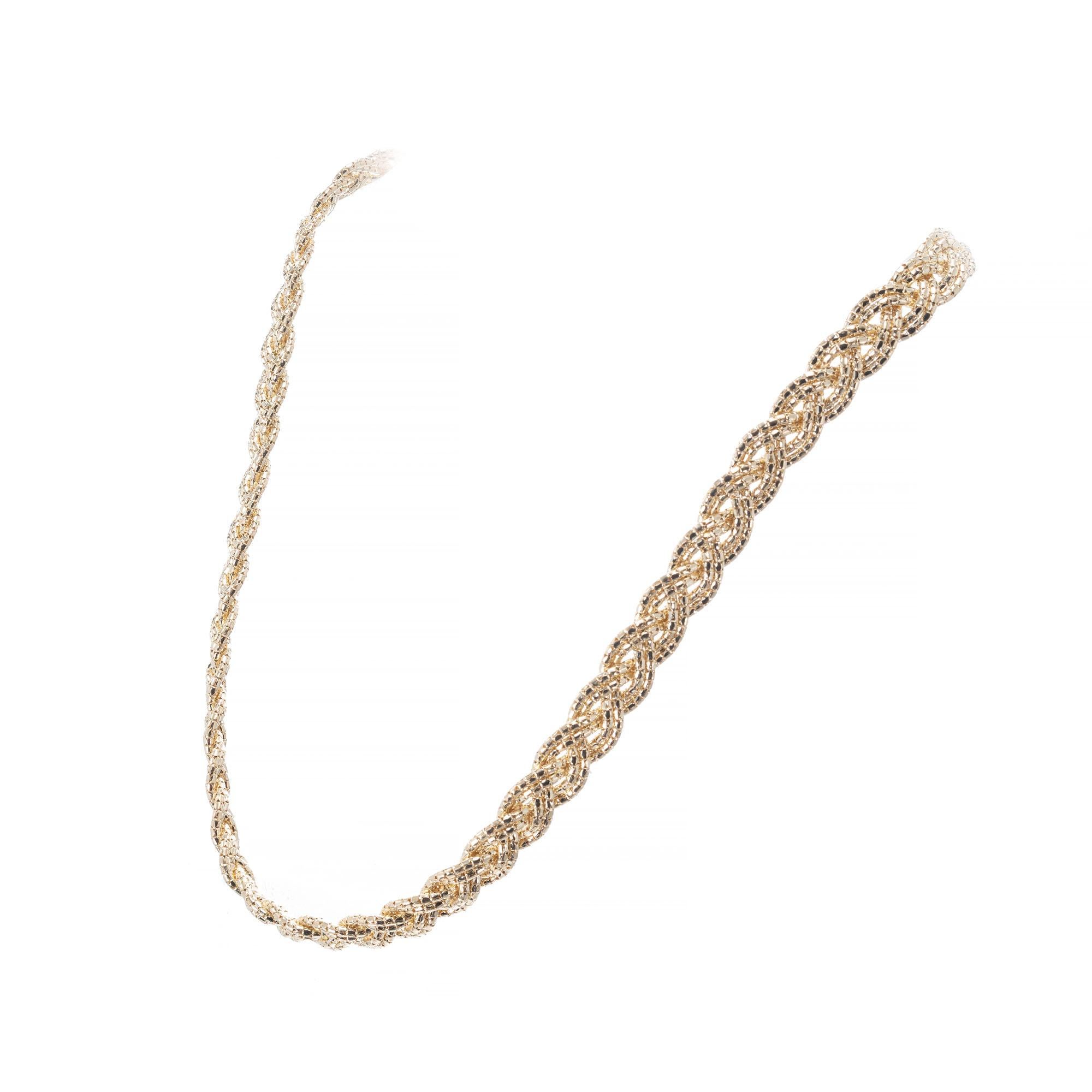 14k Yellow Gold Double Braided Chain 16 Inches Long 

14k yellow gold
Tested and stamped: 14k
21.6 grams
Length: 16 inches – Width: 8mm – Depth: 3mm
