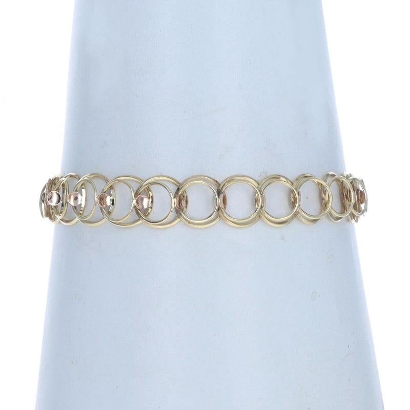 Metal Content: 14k Yellow Gold & 14k Rose Gold

Style: Double Circle Link
Fastening Type: Tab Box Clasp with Fold-Over Safety Clasp

Measurements
Length: 7 1/2