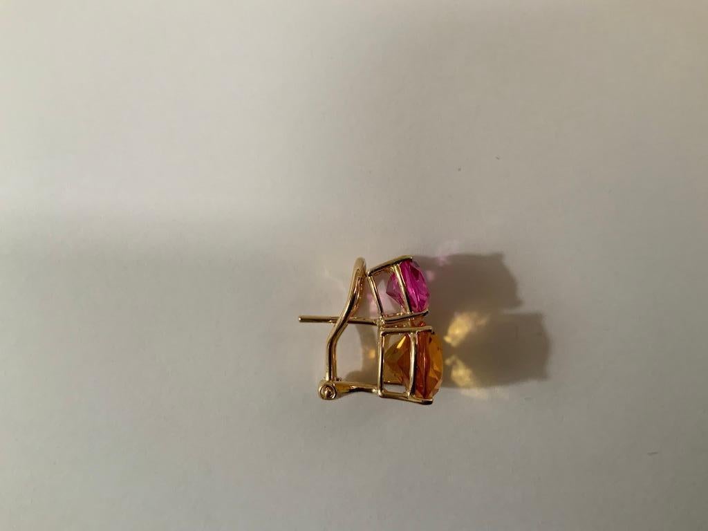 Elegant 18kt Yellow Gold Double Cushion Cut Earrings with Faceted Pink Topaz and Faceted  Orange Citrine.

This is a classic day to evening earring that can be made clip or pierced. 
The Earring meaning measures 3/4' tall and 1/2