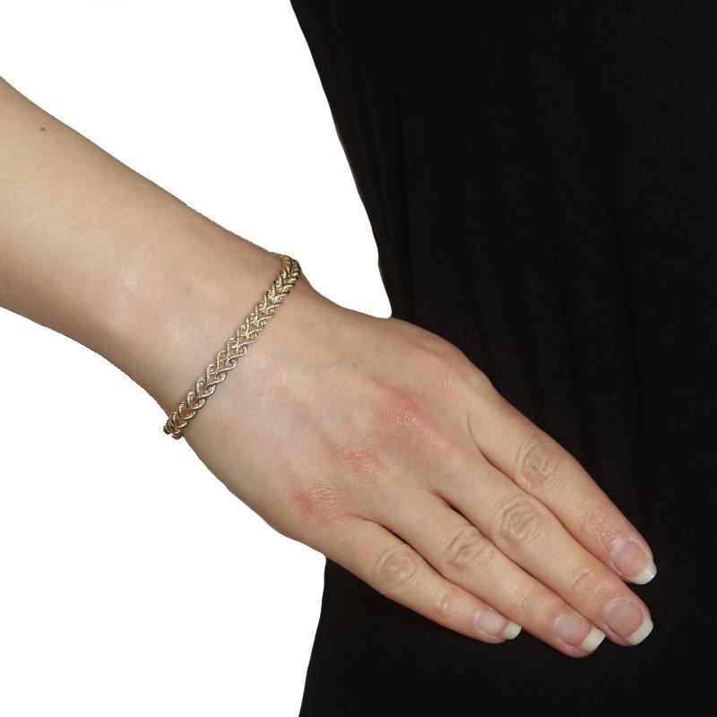 Brand: Aurafin

Metal Content: 14k Yellow Gold

Chain Style: Double Rope
Bracelet Style: Chain
Fastening Type: Lobster Claw Clasp

Measurements
Length: 7