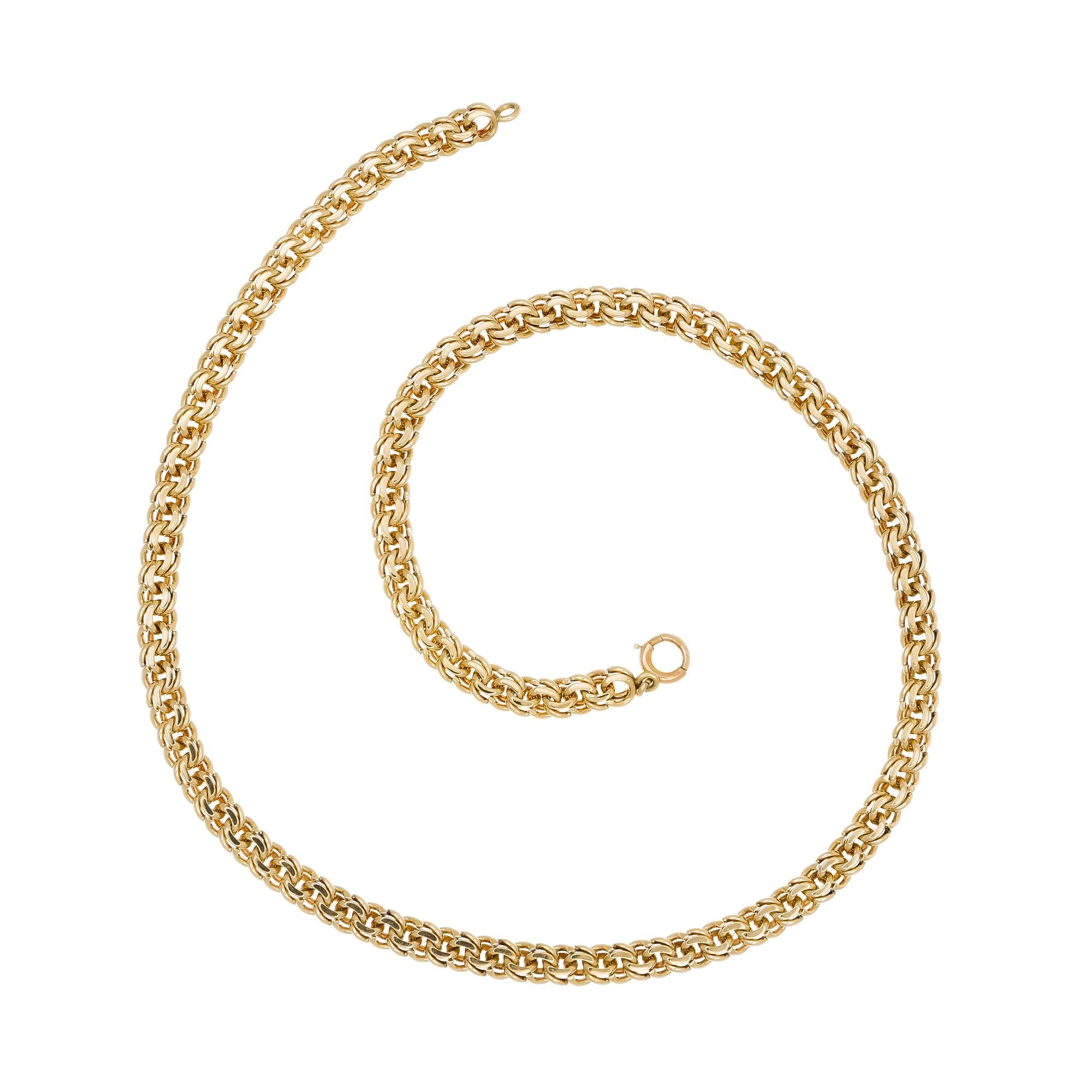 Vintage 194's handmade double spiral link 14k yellow gold necklace. 16 inch necklace.  

14k yellow gold
32.3 grams
Tested and stamped: 14k
Length: 16 inches - Width: 5.61mm - Depth 3.03mm