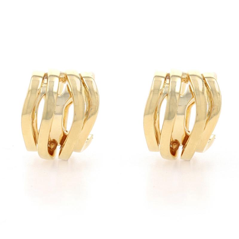 Go from day to evening with ease wearing these chic hoops! Crafted in glowing 18k yellow gold, this pair showcases a half-hoop silhouette graced with an elegant double wave pattern.  

Metal Content: 18k Yellow Gold

Style: Half-Hoop 
Fastening