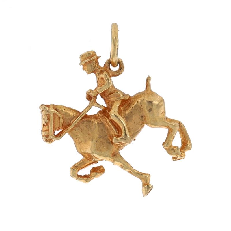 Metal Content: 14k Yellow Gold

Theme: Dressage Horse & Rider, Equestrian

Measurements
Tall: 23/32