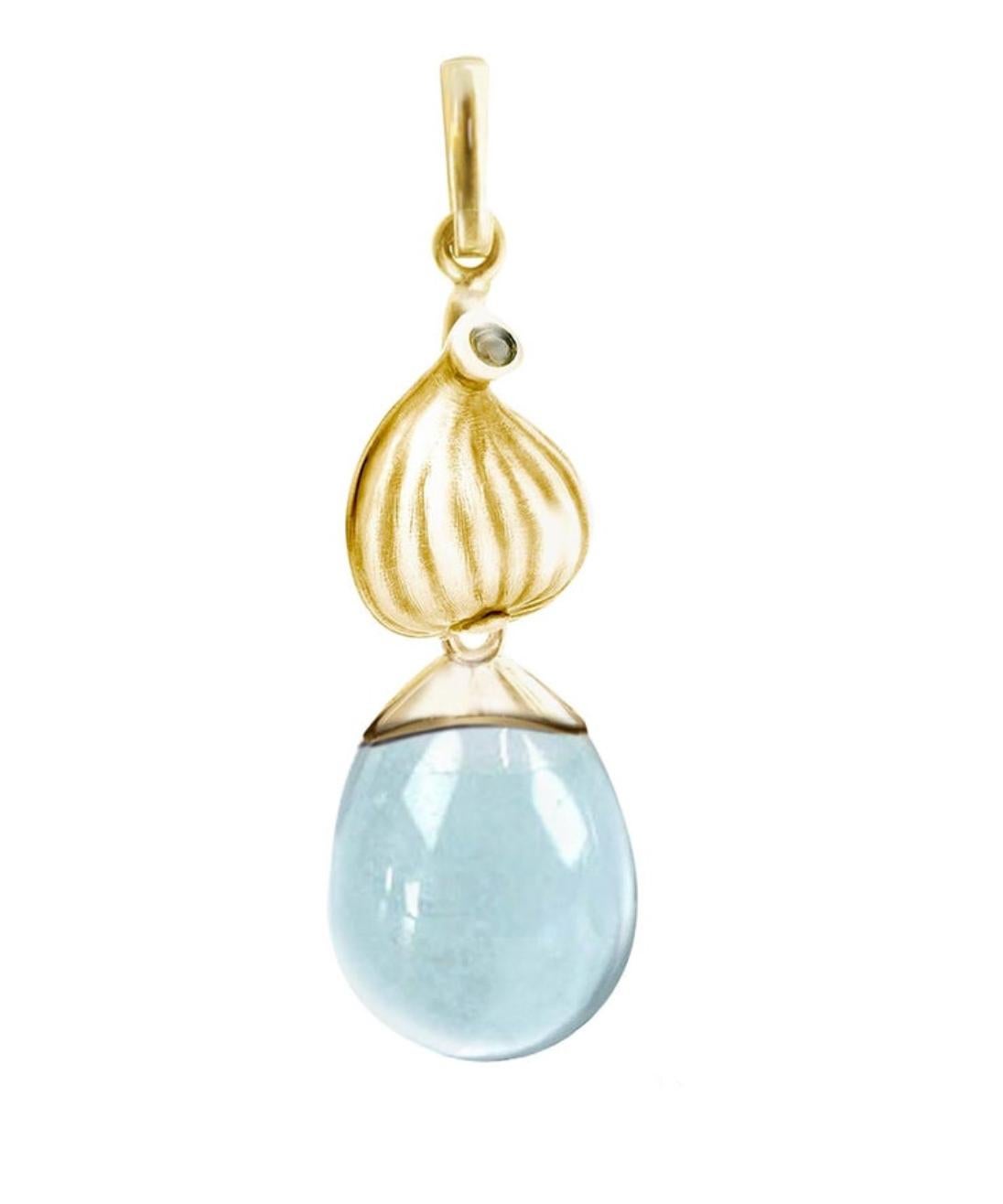 This 14 karat yellow gold Fig drop pendant necklace features a cabochon natural topaz gem that is open to light. The collection was previously featured in Vogue UA.

The artist, Polya Medvedeva, was inspired to create a jewelry collection featuring