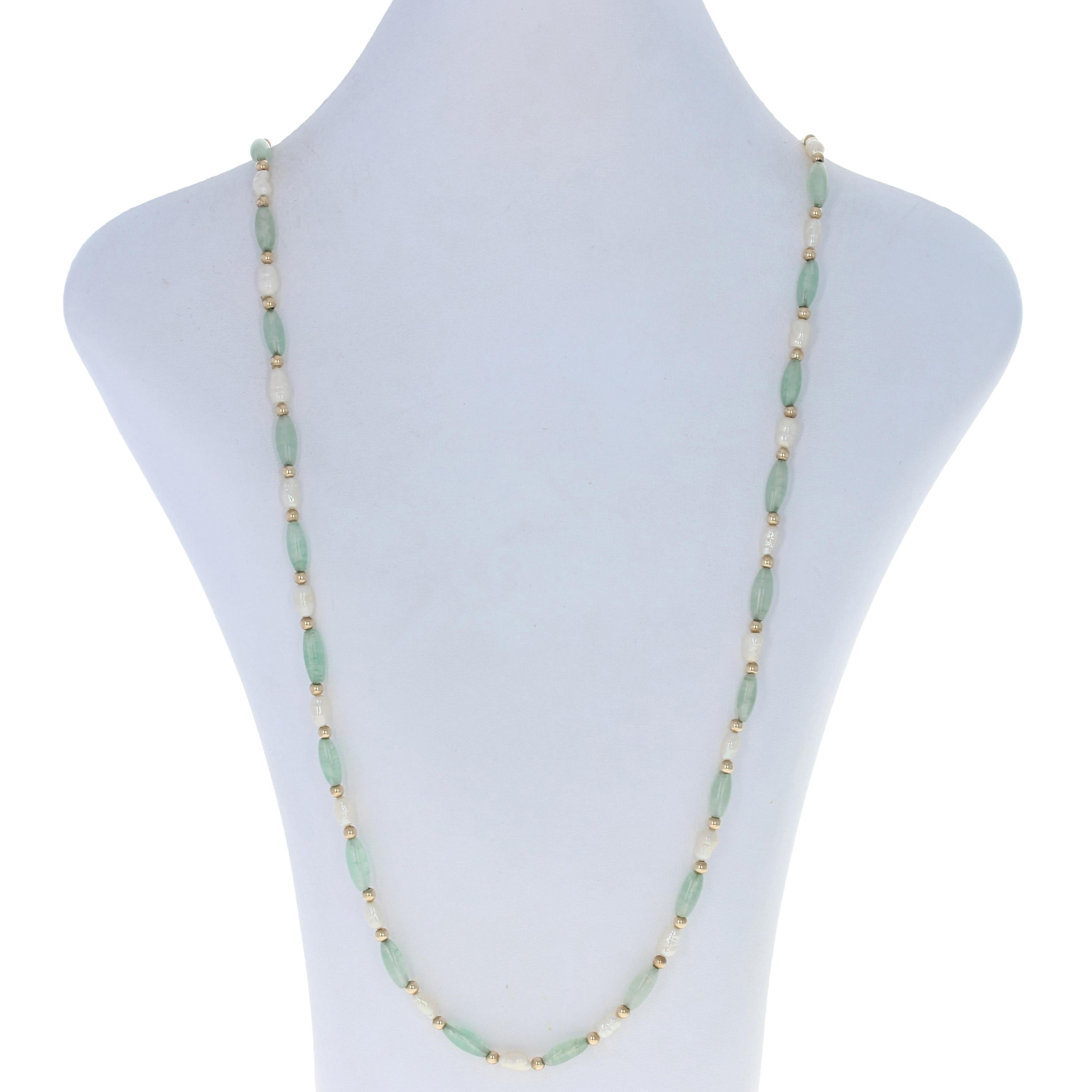 Metal Content: Guaranteed 14k Gold as tested

Stone Information: 
Genuine Quartz 
Treatment: Dyed  
Color: Green  

Genuine Rice Pearls

Necklace Style: Beaded 
Measurements: length 30 1/2