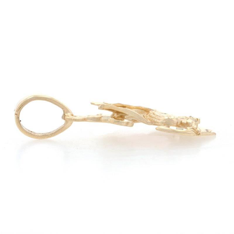 Brand: Michael Anthony

Metal Content: 14k Yellow Gold

Theme: Eagle & Anchor, Nautical 
Features: Matte Finish with Etched Detailing

Measurements
Tall (from stationary bail): 1 1/4