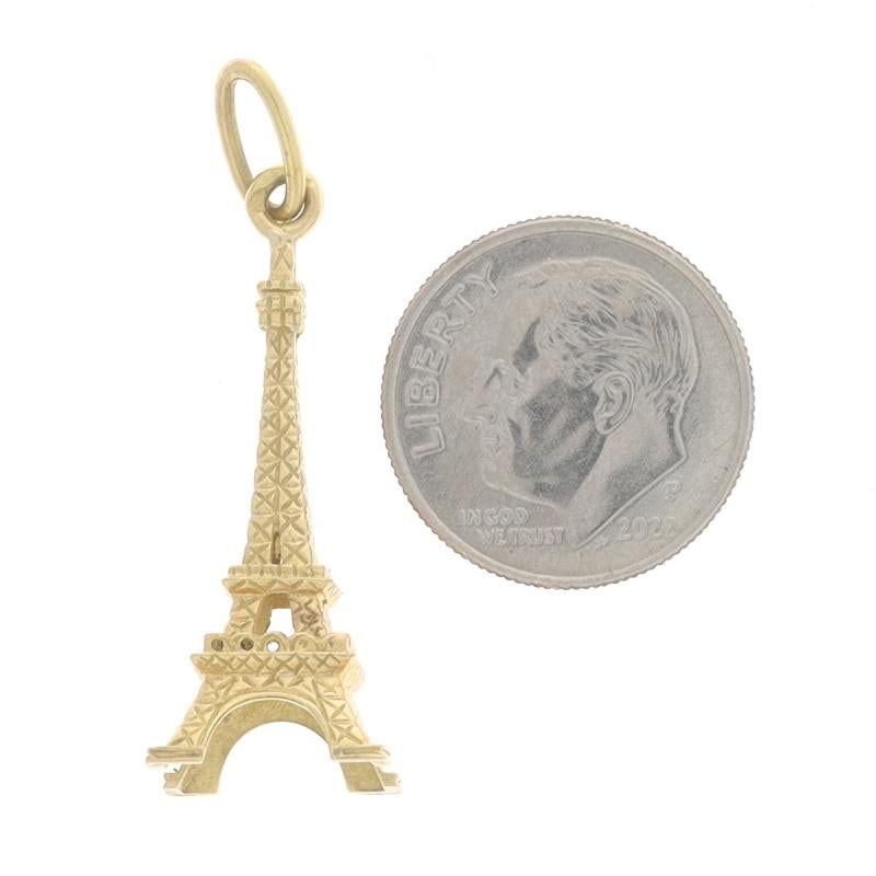 Metal Content: 18k Yellow Gold

Theme: Eiffel Tower, Paris, France, Travel Gift

Measurements
Tall (from stationary bail): 1 3/16