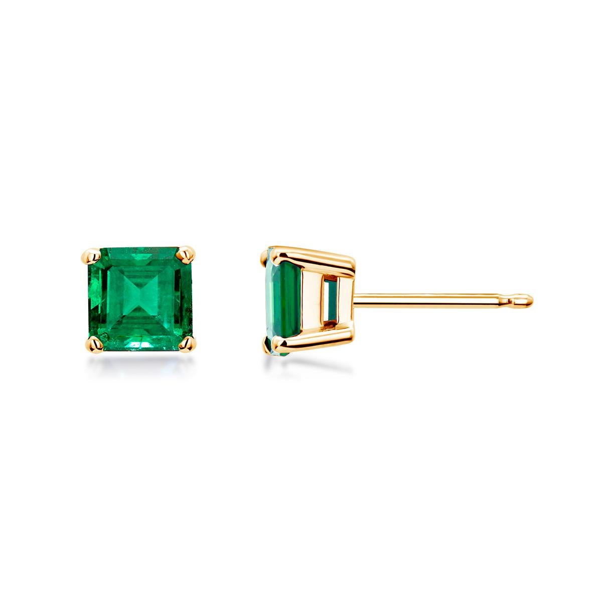 Contemporary Yellow Gold Emerald Cut Colombia Emerald Stud Earrings Weighing 1.10 Carat