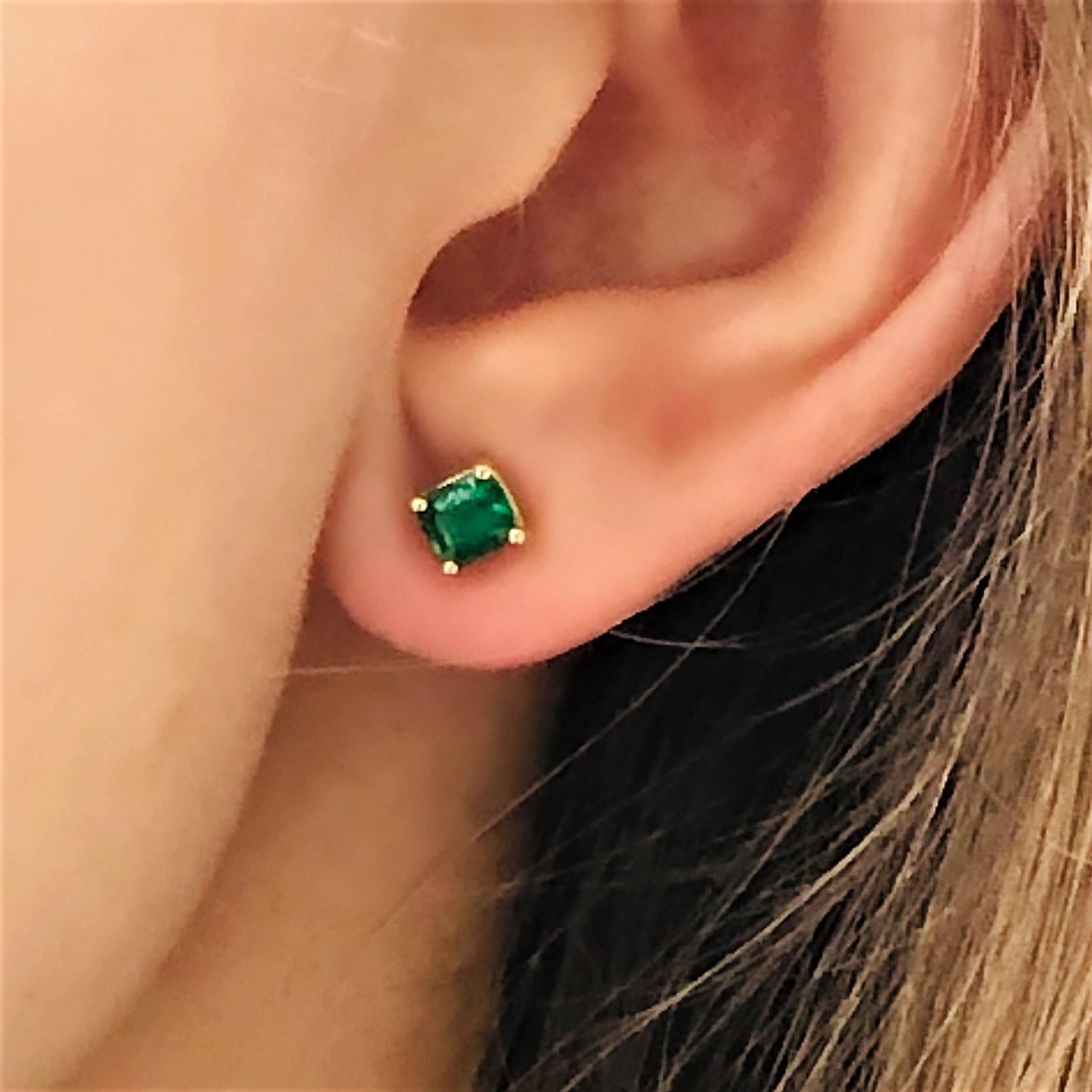 14 karats yellow gold 5-millimeter Colombian emerald stud earrings 
Emerald weighing 0.80 carats
Width of the earrings 5.5 millimeter 
New Earrings
Our design team select gemstones for their quality, aesthetic beauty and sale value of the featured