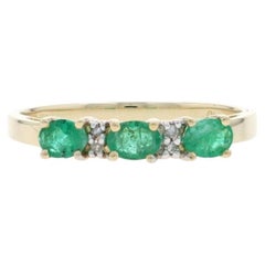 Yellow Gold Emerald Diamond Band - 10k Oval .26ctw Three-Stone Ring