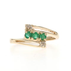 Yellow Gold Emerald Diamond Bypass Ring - 10k Round .31ctw Three-Stone